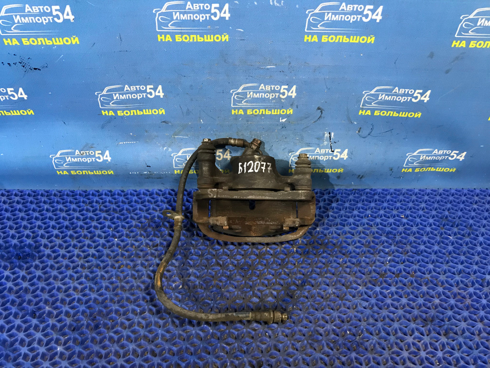 Суппорт тормозной передний левый TOYOTA CALDINA 1997-2002