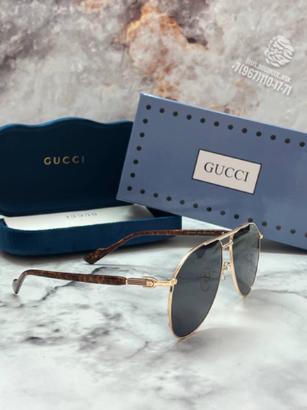 Солнцезащитные очки Gucci