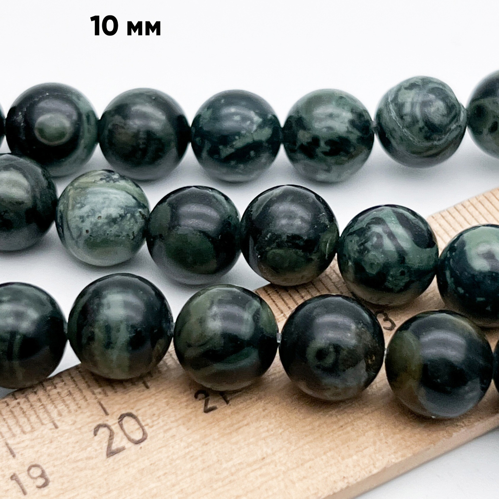 "Яшма камбаба" (риолит), диаметр около 10,5-10,7 мм, цена за 18 шт (1/2 нити)