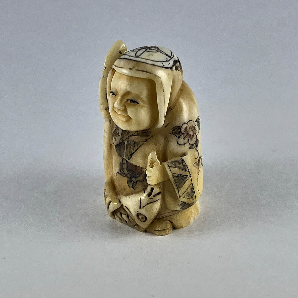 Статуэтка нэцкэ Ребенок с посохом и карпом