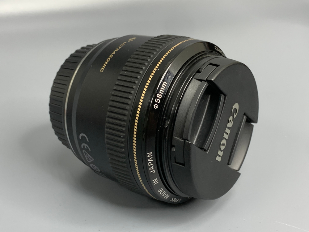 Canon EF 28mm 1.8 USM царапина на линзе