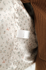 Бело-бежевая шуба из испанской овчины тиградо