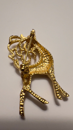 Новогодняя брошь олень