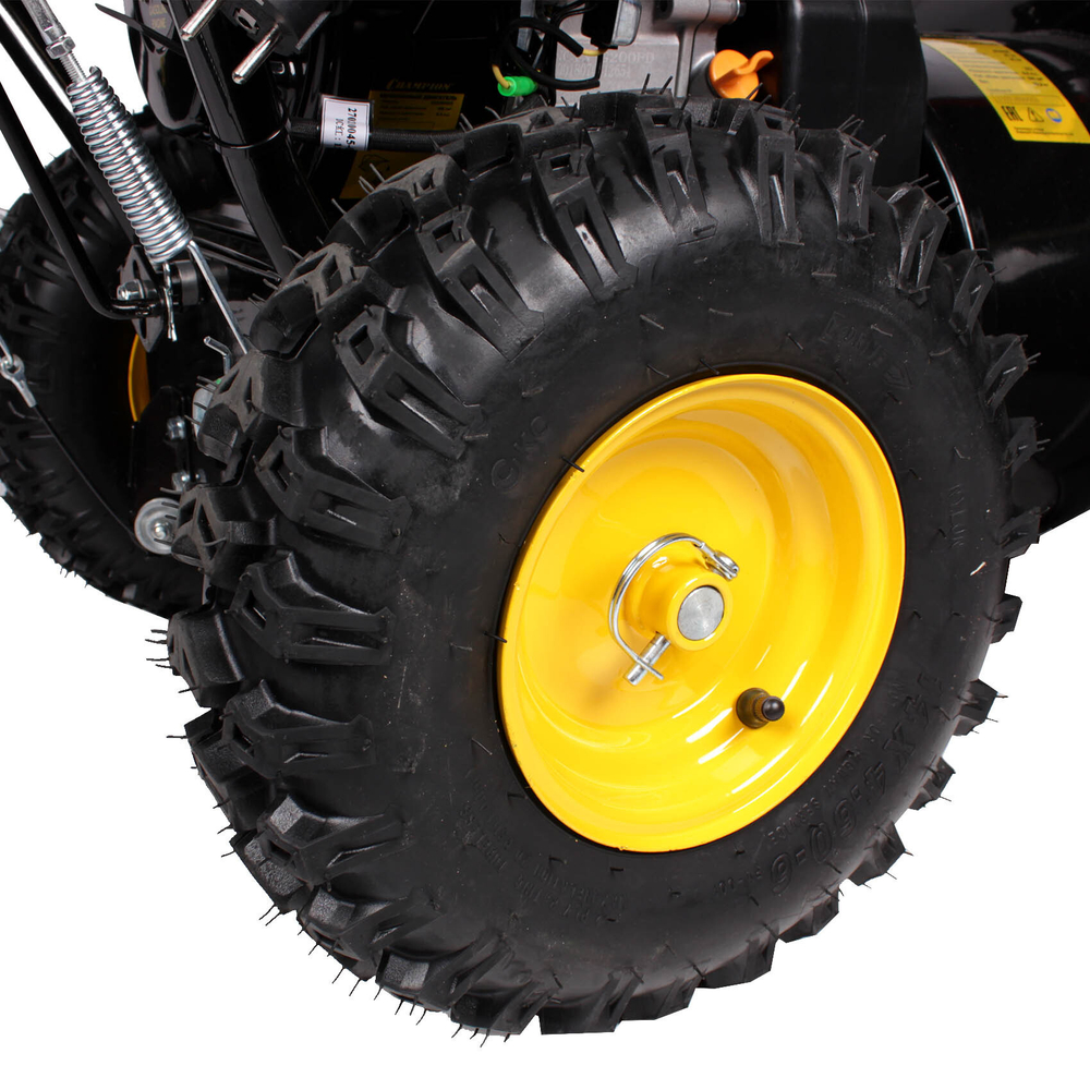 Снегоуборочная машина Champion ST662E (6,5лс 61см 3,6л 80,5кг эл.стартер, фары, обогрев рук)