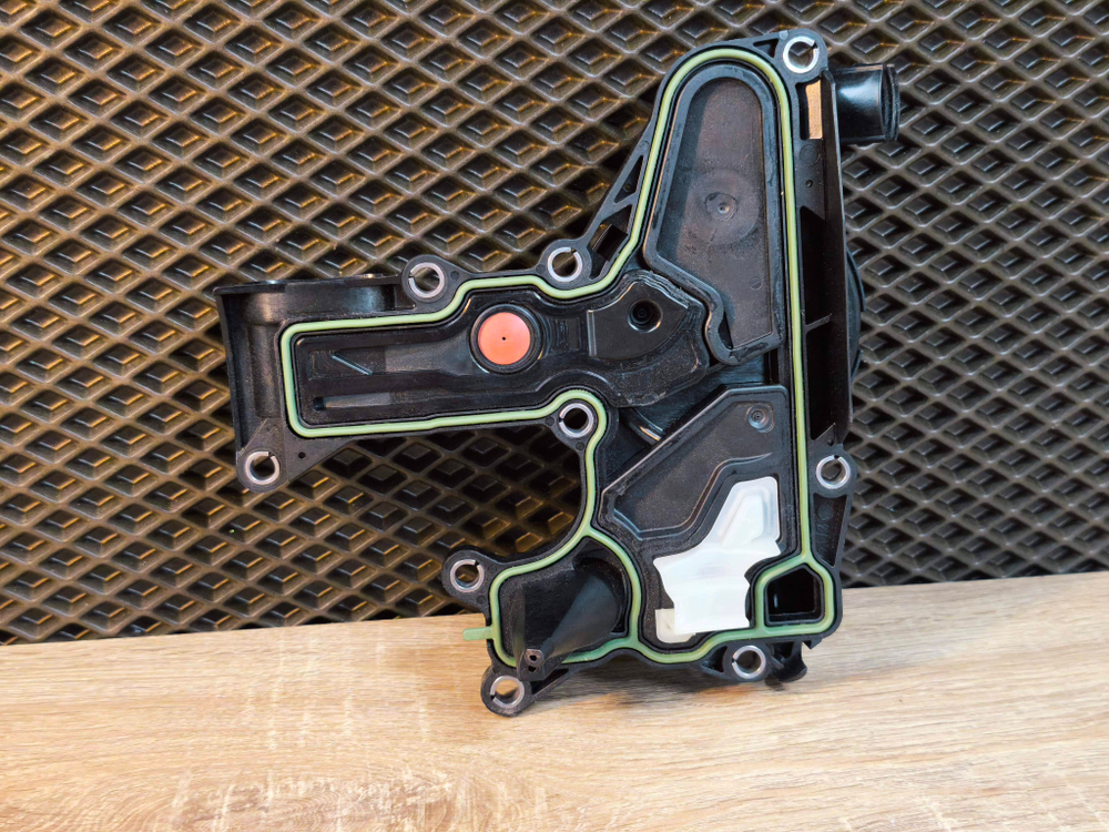 Оригинальный маслоотделитель VAG Hengst  06H103495AJ