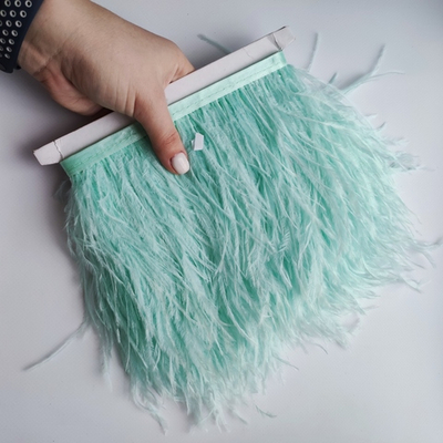 Перья страуса на ленте мята (перьевая тесьма) 10 - 15 см.