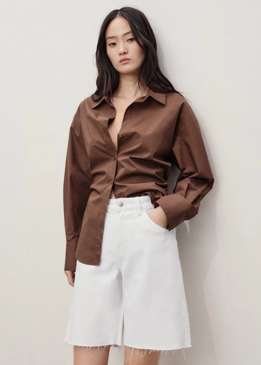 Джинсовые бермуды с бахромой по низу