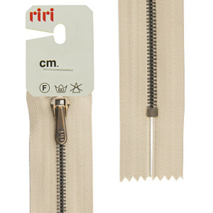 Молния металлическая неразъемная (металл состаренная бронза) (Riri, Ткань/металл, Светло-бежевая тесьма 28939, 18)