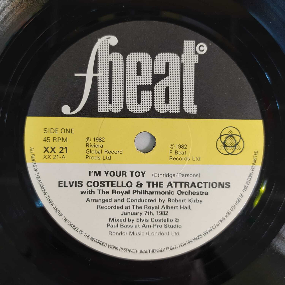 Elvis Costello And The Attractions With The Royal Philharmonic Orchestra - I'm Your Toy (Великобритания 1982г.) 7", 45 RPM, Single