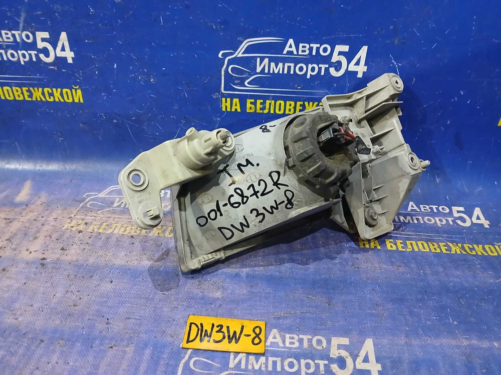 Фара передняя правая MAZDA DEMIO 1998