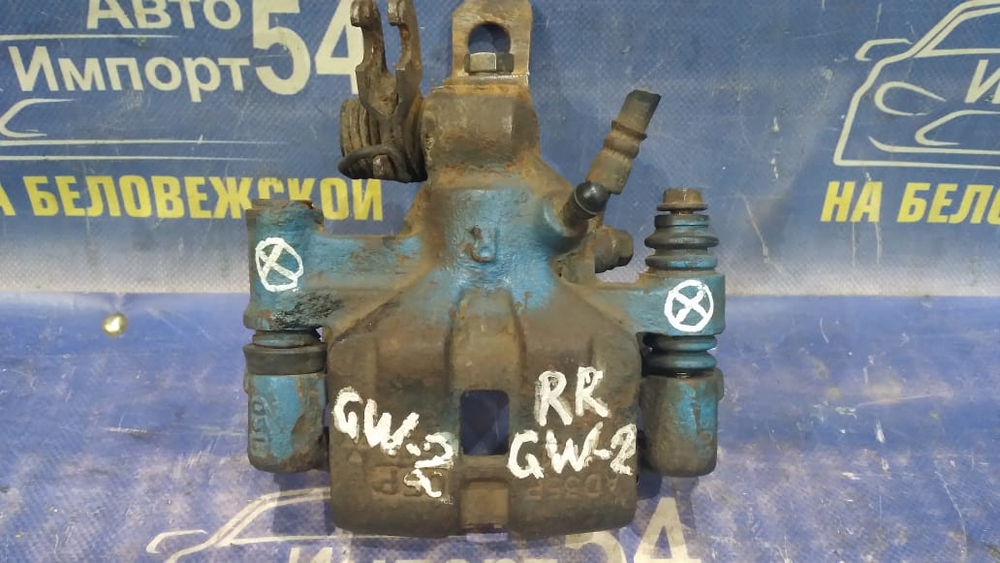 Суппорт тормозной задний правый MAZDA CAPELLA 2000