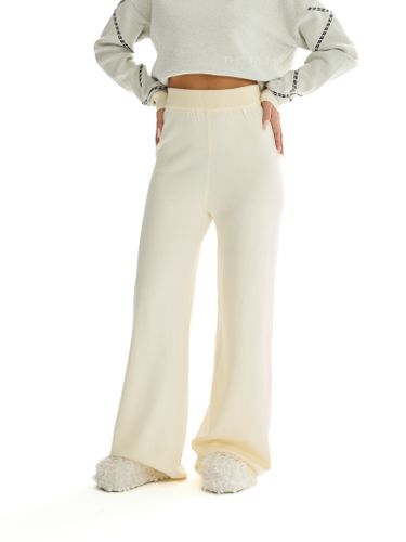 Костюм трикотажный молочного цвета