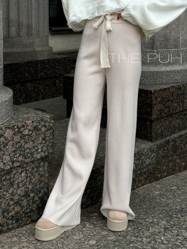 Брюки трикотажные женские бежевого цвета