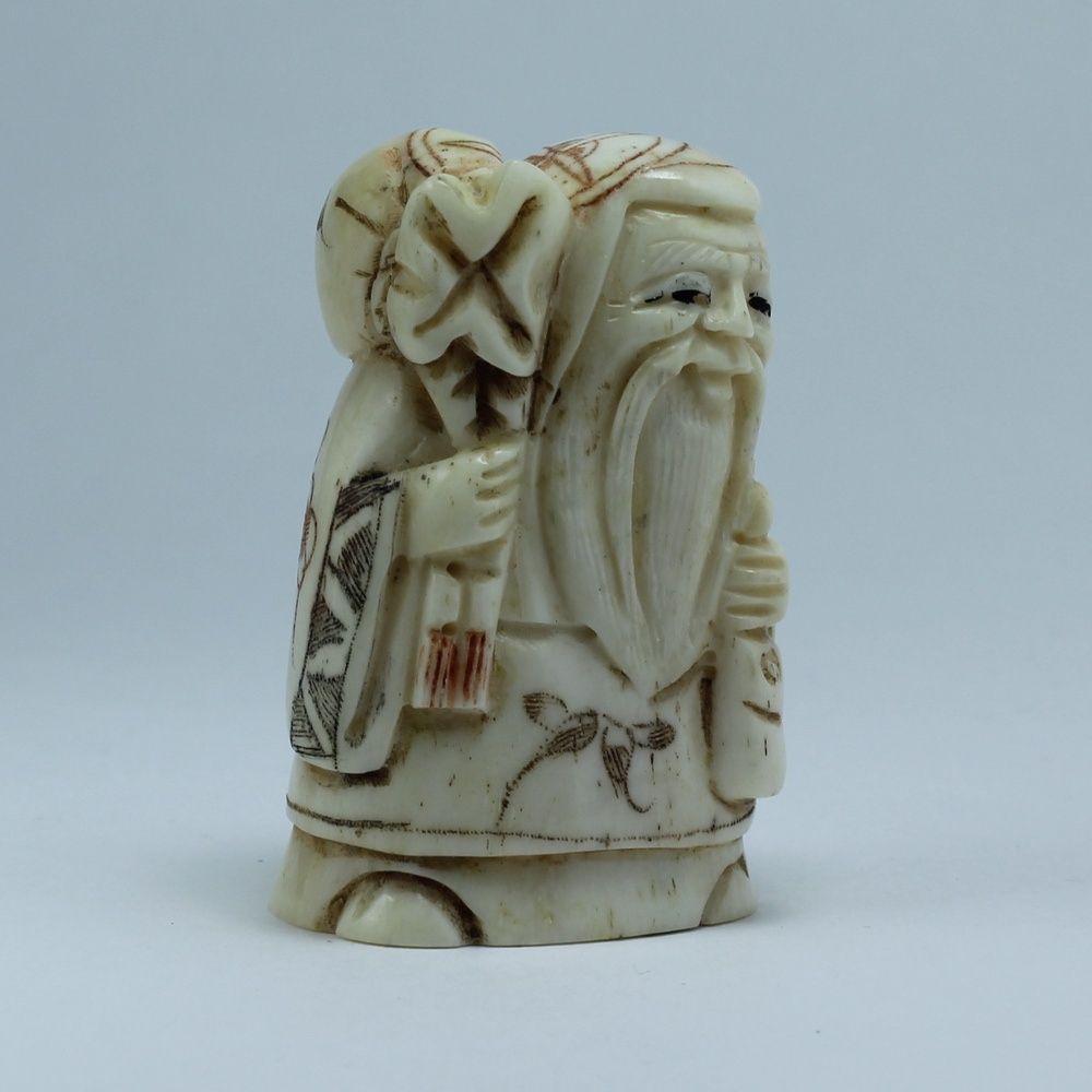 Нэцкэ Фукурокудзю с мешком и кисетом