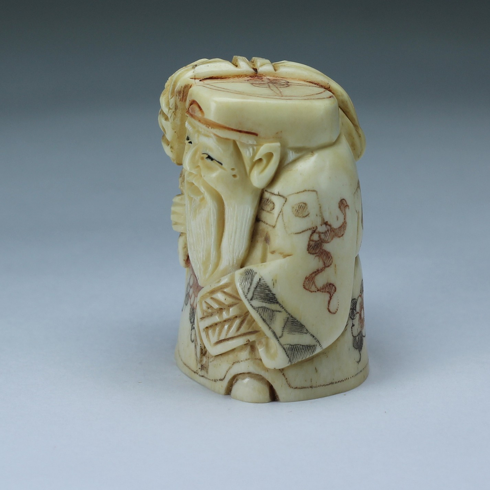 Нэцкэ Дзюродзин с хворостом и веером