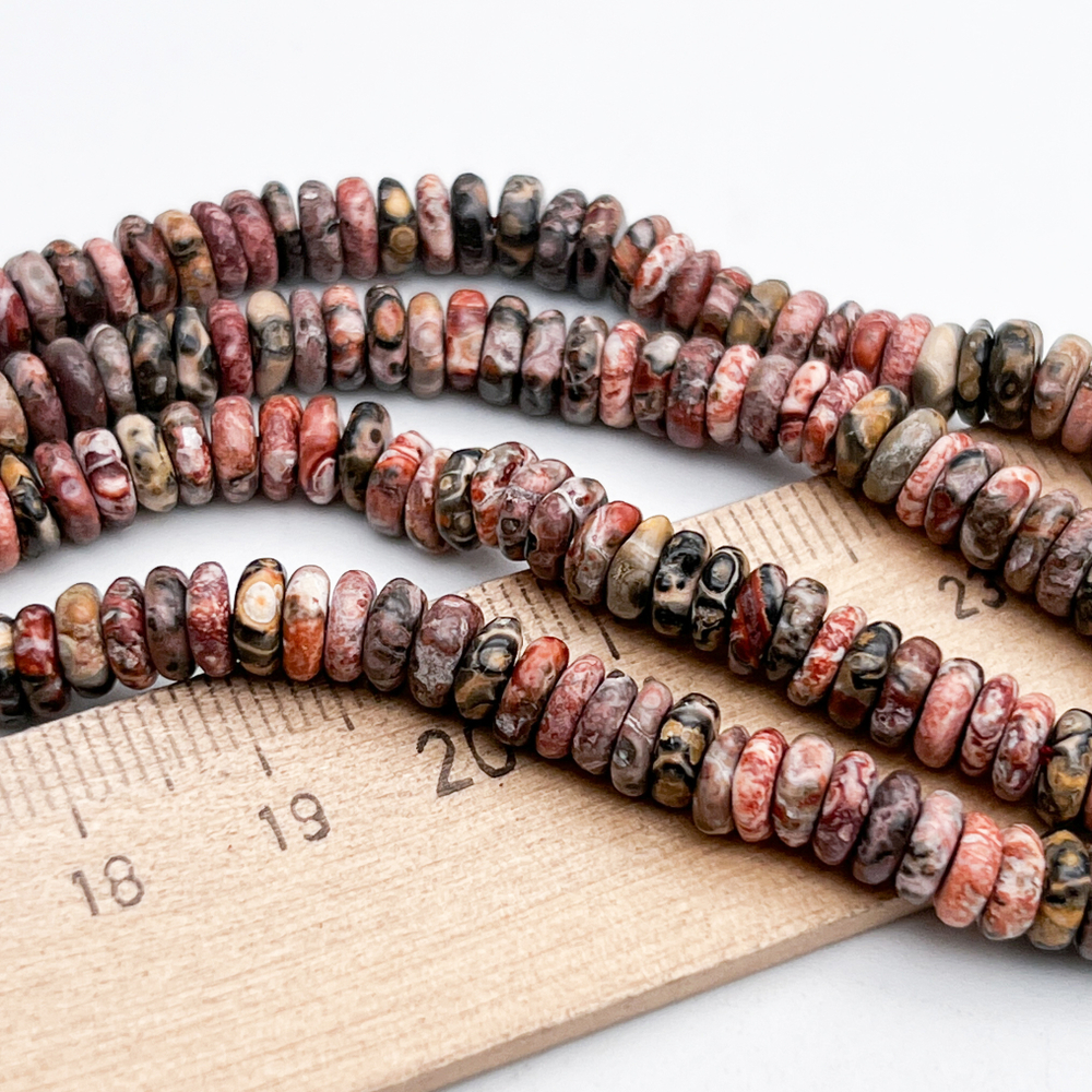 Риолит бусины, рондель, размер около 1,8-2,5*5,5-6 мм, цена за отрезок 19 см (1/2 нити)