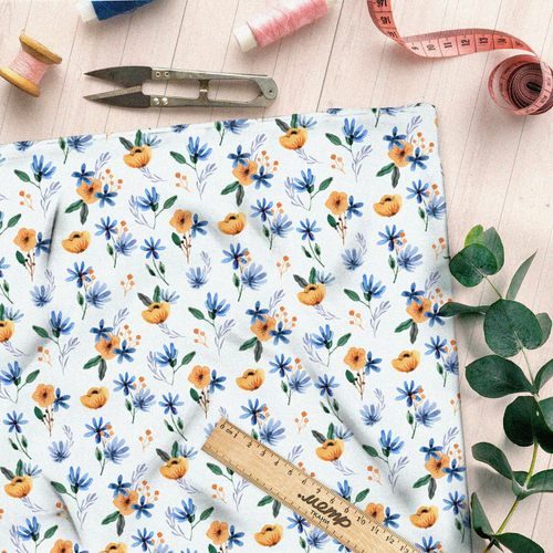 Ткань штапель оранжевые цветочки с голубыми листочками