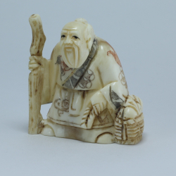 Эксклюзивная нэцкэ Монах с посохом и корзиной рыбы