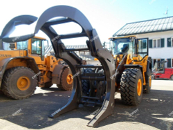 Бревно захват на Экскаватор-погрузчик New Holland