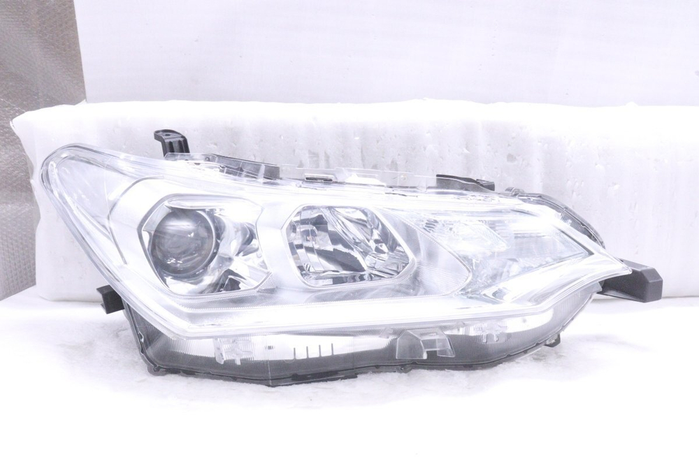 фара правая Toyota Corolla Axio NZE161 NKE165 12-595
