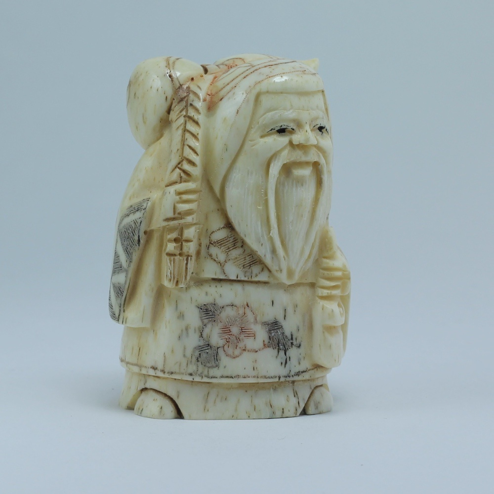 Нэцкэ Фукурокудзю с тыквой-горлянкой и кисетом