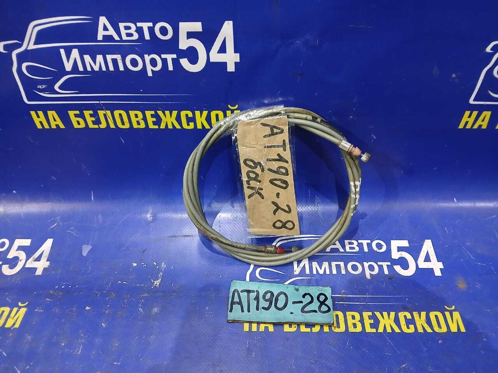 Трос лючка бензобака TOYOTA CARINA E 1992