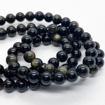 Обсидиан "Золотой" бусины, диаметр 6,3-6,5 мм, цена за 28-29 шт (1/2 нити)