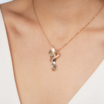 Подвеска «Тайна красоты» из комбинированного золота с топазами и натуральными топазами white