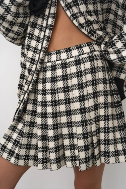 Мини-юбка в складку в клетку
