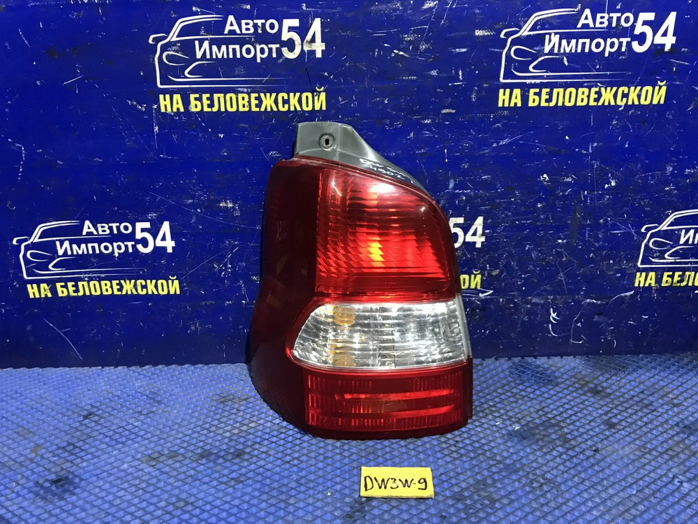 Стоп левый MAZDA DEMIO 2000