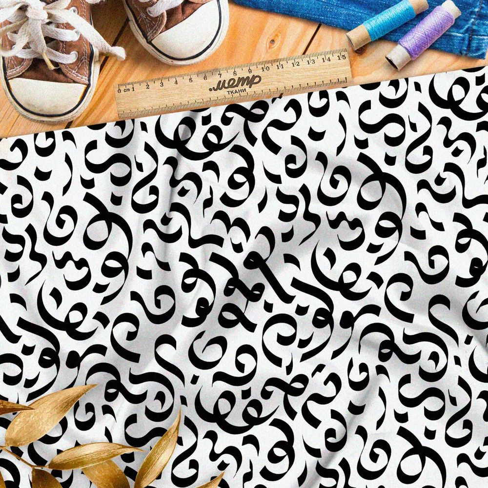 Ткань ниагара крупные каллиграфические узоры на бежевом фоне