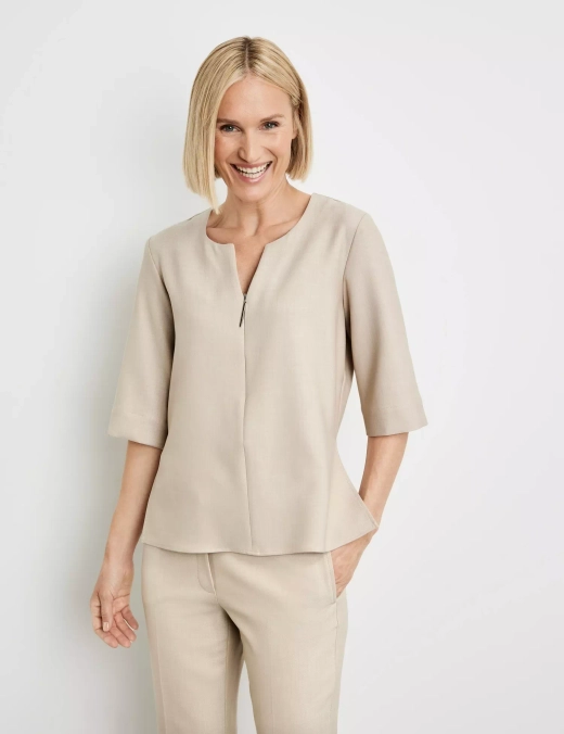 Блузка с молнией и разрезами