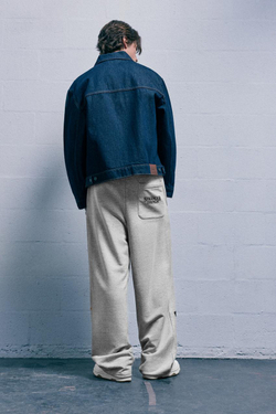 PULL&BEAR Спортивные брюки с надписью "Stranger Things", серый меланж