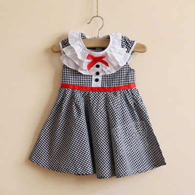 Сарафан в мелкую клетку с рюшами и бантом на груди