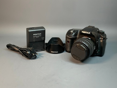 Pentax K10D kit 18-55mm 7.836 кадров