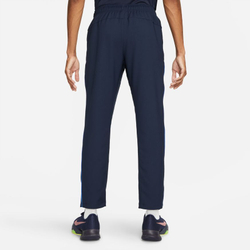 Мужские теннисные штаны Nike Dri-Fit Woven Team Training Trousers M - небесный