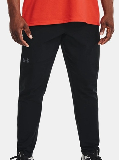 Мужские теннисные штаны Under Armour Men's UA Unstoppable Tapered Pants - black/pitch gray