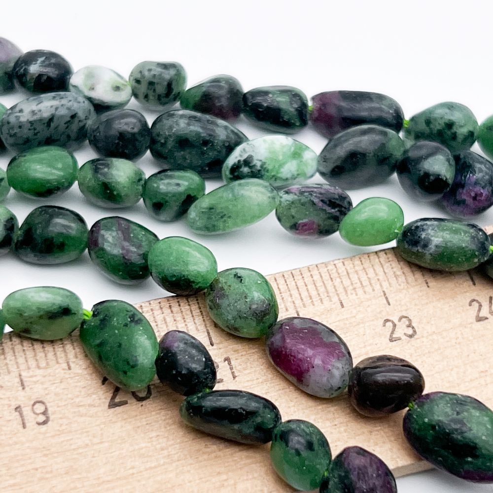 Цоизит бусины, галтовка, размер около 6-9 мм, цена за нить 38 см