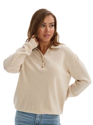 Бежевое поло с длинным рукавом из шерсти