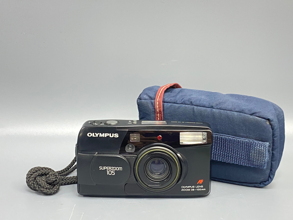 Olympus SuperZoom 105 мажет мимо пленки