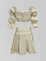 Костюм Dzhadagaevs Brand 007 из юбки на широкой резинке и короткого топа на шнуровке