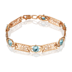 Браслет из красного золота с топазами