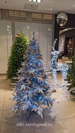 Заснеженная елка с гирляндой «Форесто» холодный свет (Литая+пвх) 180 см / 1,8 м