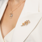 Брошь «Змея» из комбинированного золота с цитринами