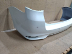 бампер задний Toyota Corolla Fielder NZE161 164
