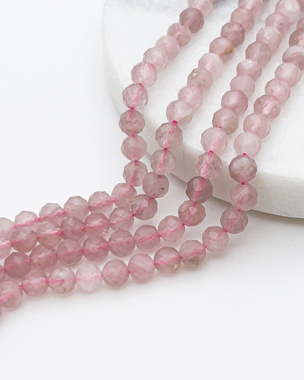Розовый кварц граненый, размер около 5-5,2 мм, цена за нить 79-80 шт (около 38 см)