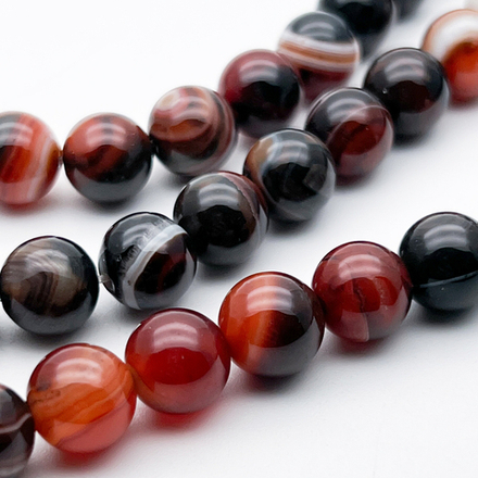 Агат тонированный черно-коричневый, диаметр 10,1-10,2 мм, цена за 18-19 шт (1/2 нити)