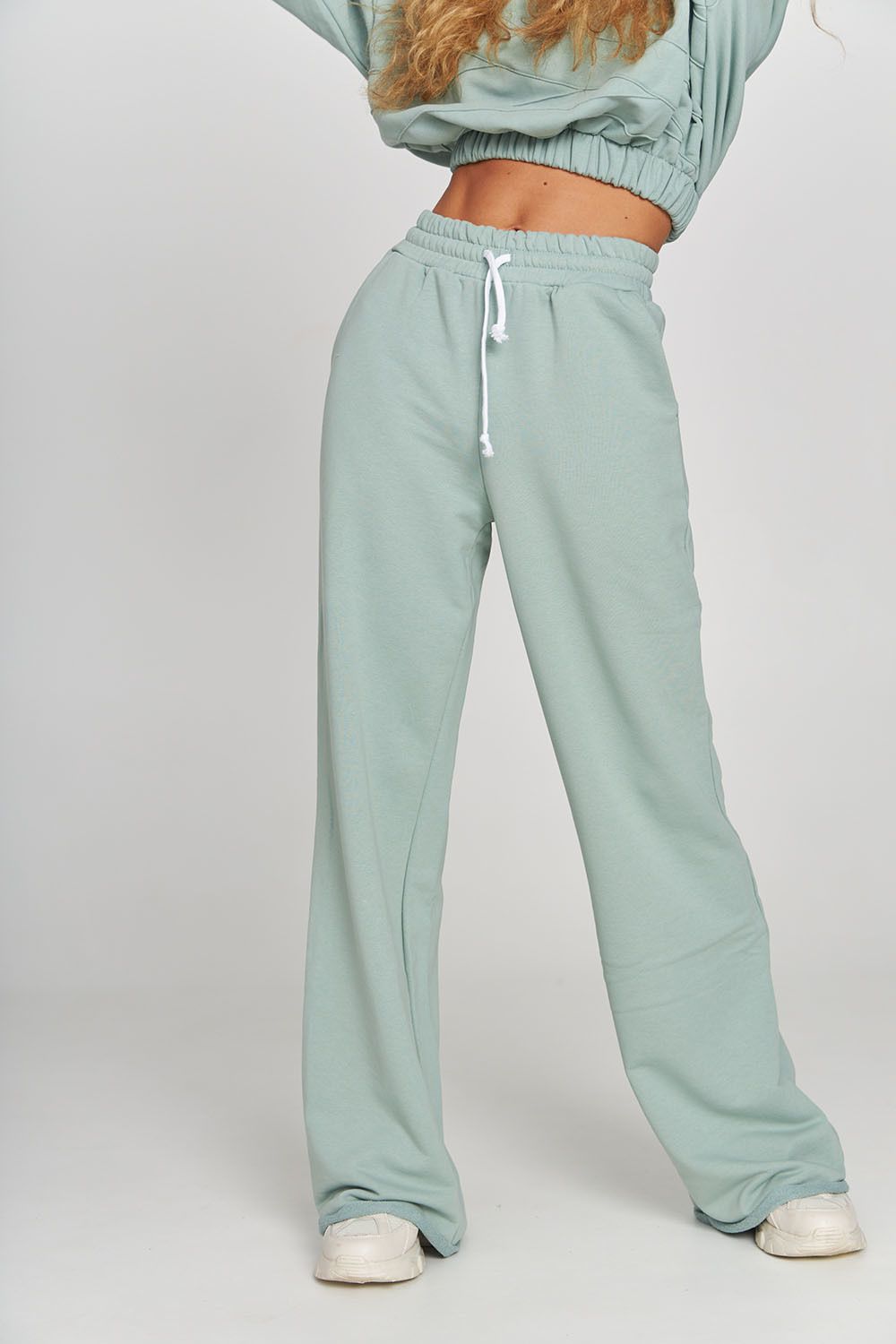 Брюки клеш из футера в цвете холодная мята