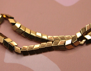 Бусина гематит 6х6 мм золото