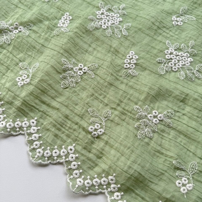 Вышивка Лиссабон (на жатой зеленой органзе)